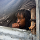 A girl watches as authorities evacuate her house in Tabarre, Haiti, on Oct. 3rd. Image: AP